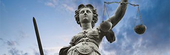 Image of Lady Justice with sword and scales