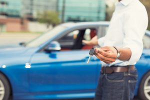 Photo of a male holding car keys
